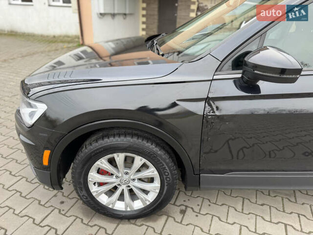 Чорний Фольксваген Тігуан, об'ємом двигуна 2 л та пробігом 232 тис. км за 14200 $, фото 4 на Automoto.ua