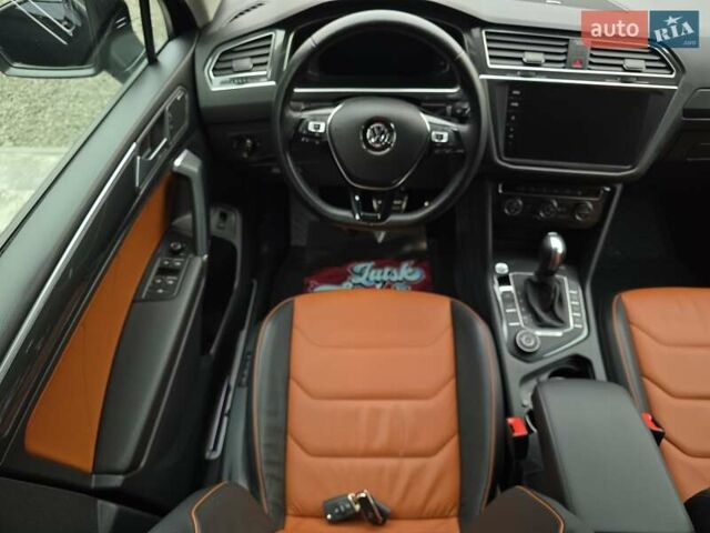 Черный Фольксваген Тигуан, объемом двигателя 2 л и пробегом 199 тыс. км за 31000 $, фото 92 на Automoto.ua