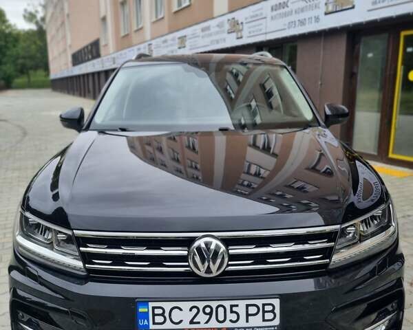 Черный Фольксваген Тигуан, объемом двигателя 2 л и пробегом 58 тыс. км за 26900 $, фото 1 на Automoto.ua