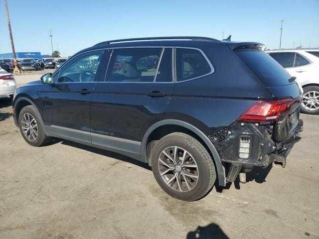 Черный Фольксваген Тигуан, объемом двигателя 2 л и пробегом 64 тыс. км за 4000 $, фото 1 на Automoto.ua