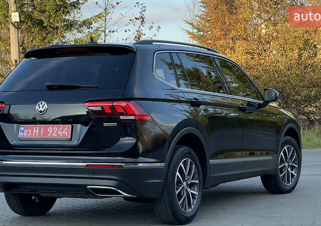 Черный Фольксваген Тигуан, объемом двигателя 2 л и пробегом 170 тыс. км за 18799 $, фото 28 на Automoto.ua