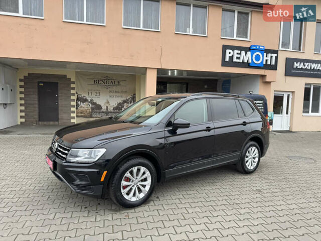 Чорний Фольксваген Тігуан, об'ємом двигуна 2 л та пробігом 232 тис. км за 14200 $, фото 3 на Automoto.ua
