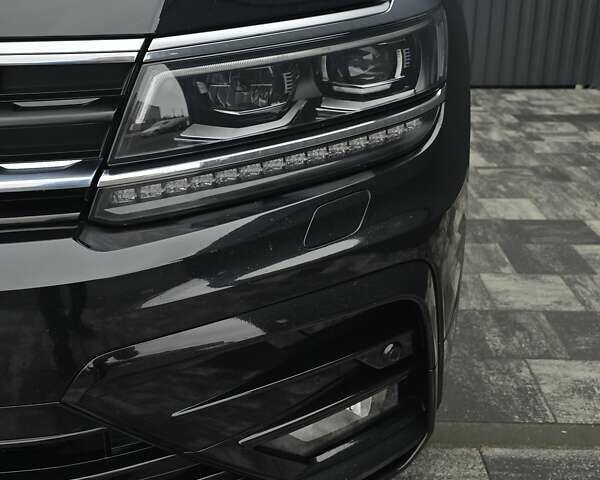 Черный Фольксваген Тигуан, объемом двигателя 2 л и пробегом 199 тыс. км за 31000 $, фото 32 на Automoto.ua