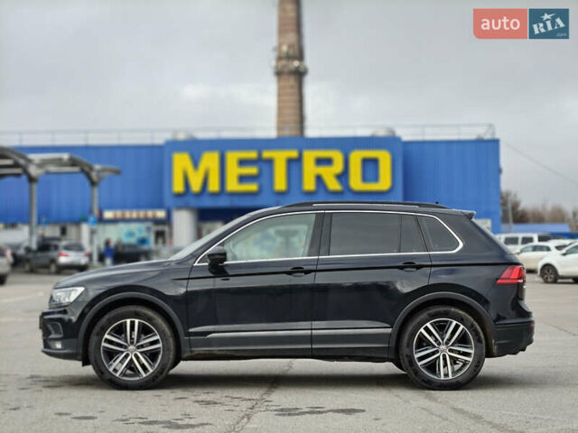 Черный Фольксваген Тигуан, объемом двигателя 1.97 л и пробегом 208 тыс. км за 25300 $, фото 5 на Automoto.ua