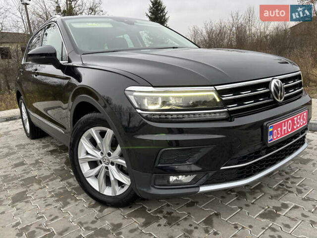 Черный Фольксваген Тигуан, объемом двигателя 2 л и пробегом 227 тыс. км за 24100 $, фото 1 на Automoto.ua