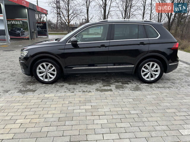 Черный Фольксваген Тигуан, объемом двигателя 2 л и пробегом 227 тыс. км за 24100 $, фото 11 на Automoto.ua