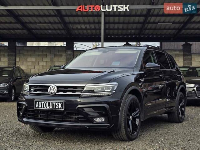 Черный Фольксваген Тигуан, объемом двигателя 2 л и пробегом 199 тыс. км за 31000 $, фото 2 на Automoto.ua