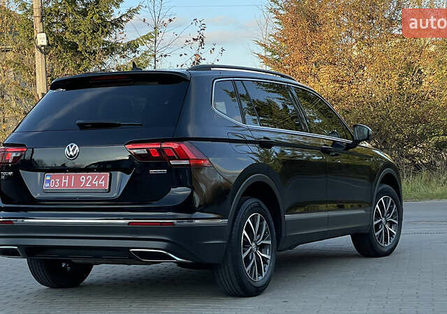 Черный Фольксваген Тигуан, объемом двигателя 2 л и пробегом 170 тыс. км за 18799 $, фото 27 на Automoto.ua