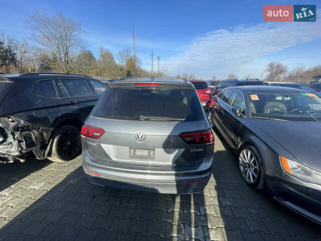 Чорний Фольксваген Тігуан, об'ємом двигуна 2 л та пробігом 79 тис. км за 11500 $, фото 2 на Automoto.ua