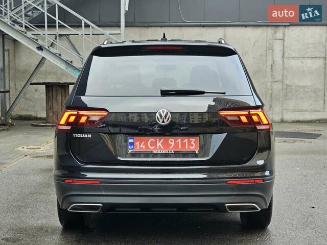 Черный Фольксваген Тигуан, объемом двигателя 2 л и пробегом 106 тыс. км за 18999 $, фото 3 на Automoto.ua