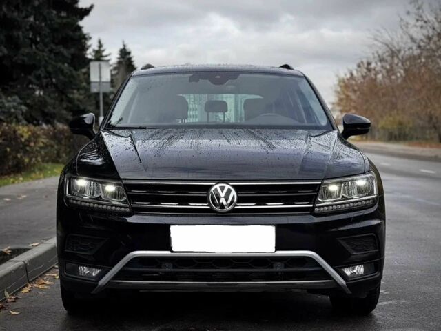 Чорний Фольксваген Тігуан, об'ємом двигуна 2 л та пробігом 134 тис. км за 22000 $, фото 2 на Automoto.ua