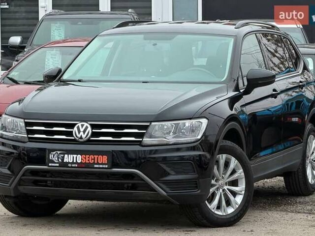Чорний Фольксваген Тігуан, об'ємом двигуна 2 л та пробігом 129 тис. км за 17500 $, фото 1 на Automoto.ua
