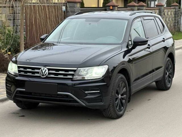 Черный Фольксваген Тигуан, объемом двигателя 2 л и пробегом 184 тыс. км за 18500 $, фото 1 на Automoto.ua