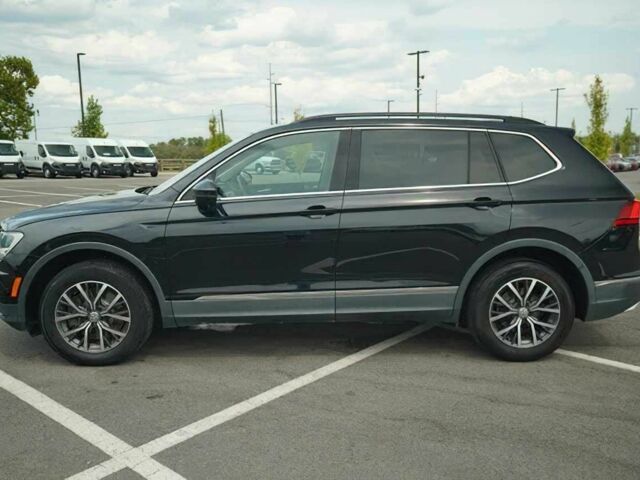 Чорний Фольксваген Тігуан, об'ємом двигуна 2 л та пробігом 47 тис. км за 9500 $, фото 3 на Automoto.ua