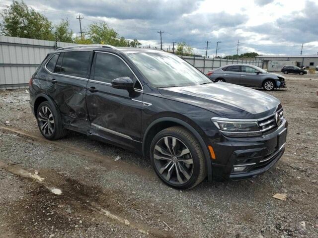 Черный Фольксваген Тигуан, объемом двигателя 2 л и пробегом 28 тыс. км за 5000 $, фото 3 на Automoto.ua