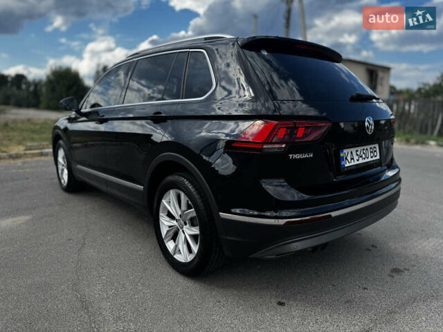 Чорний Фольксваген Тігуан, об'ємом двигуна 1.97 л та пробігом 115 тис. км за 31000 $, фото 5 на Automoto.ua