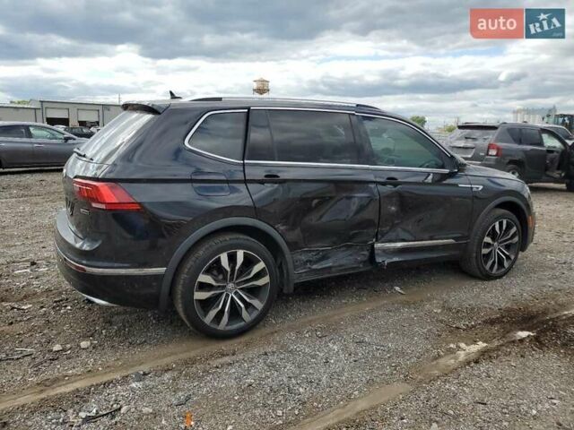Черный Фольксваген Тигуан, объемом двигателя 1.98 л и пробегом 28 тыс. км за 7500 $, фото 2 на Automoto.ua