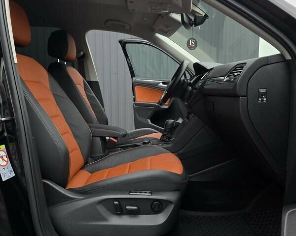 Черный Фольксваген Тигуан, объемом двигателя 2 л и пробегом 199 тыс. км за 31000 $, фото 106 на Automoto.ua