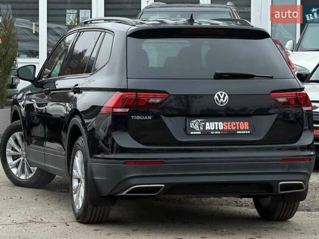 Чорний Фольксваген Тігуан, об'ємом двигуна 2 л та пробігом 129 тис. км за 17500 $, фото 7 на Automoto.ua
