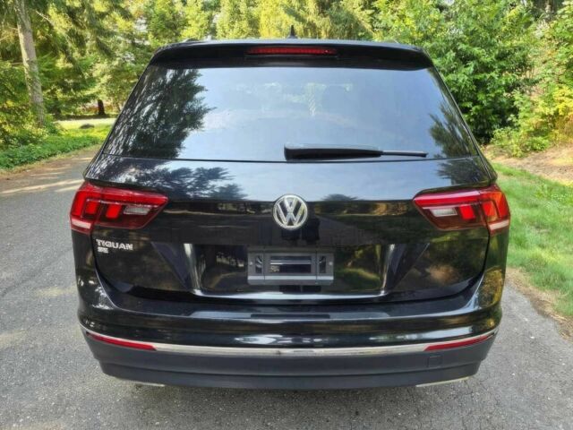 Черный Фольксваген Тигуан, объемом двигателя 2 л и пробегом 42 тыс. км за 17200 $, фото 5 на Automoto.ua