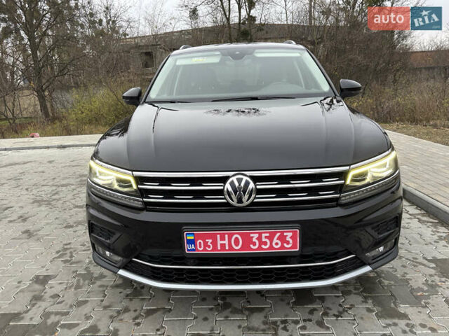 Черный Фольксваген Тигуан, объемом двигателя 2 л и пробегом 227 тыс. км за 24100 $, фото 2 на Automoto.ua