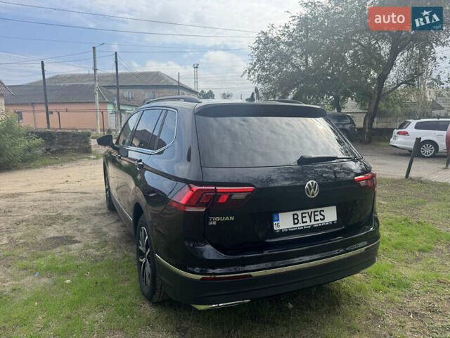 Чорний Фольксваген Тігуан, об'ємом двигуна 1.98 л та пробігом 60 тис. км за 23500 $, фото 2 на Automoto.ua