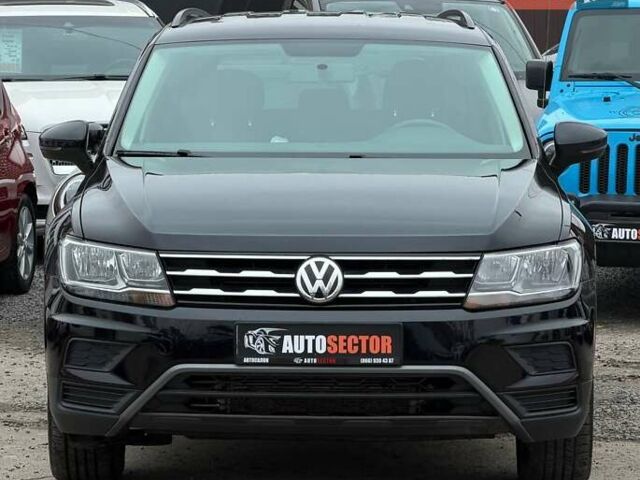 Чорний Фольксваген Тігуан, об'ємом двигуна 2 л та пробігом 129 тис. км за 17500 $, фото 3 на Automoto.ua