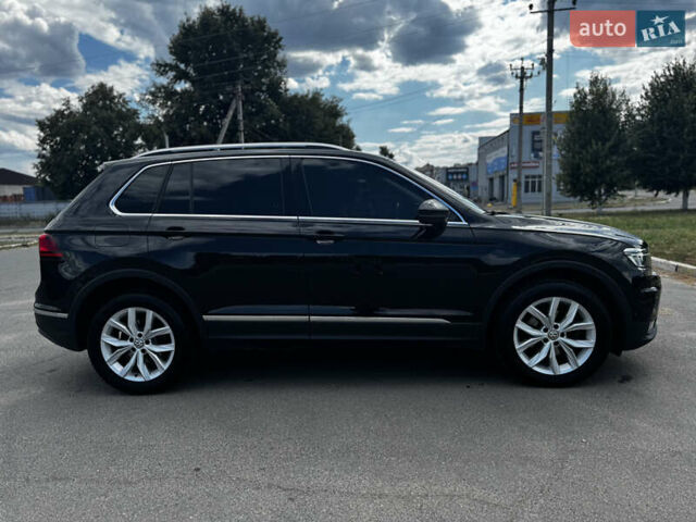 Чорний Фольксваген Тігуан, об'ємом двигуна 1.97 л та пробігом 115 тис. км за 31000 $, фото 3 на Automoto.ua