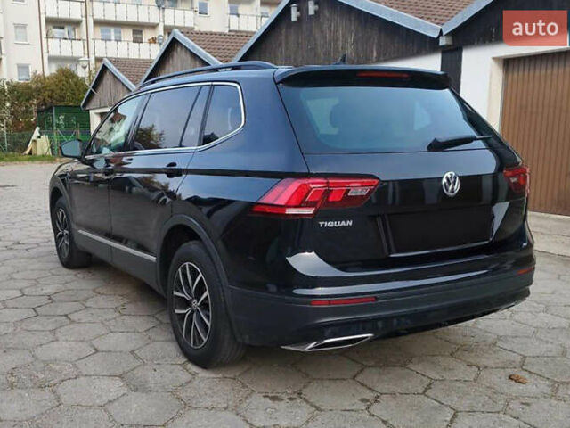 Черный Фольксваген Тигуан, объемом двигателя 2 л и пробегом 96 тыс. км за 16300 $, фото 2 на Automoto.ua