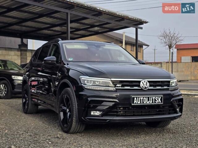Черный Фольксваген Тигуан, объемом двигателя 2 л и пробегом 199 тыс. км за 31000 $, фото 1 на Automoto.ua