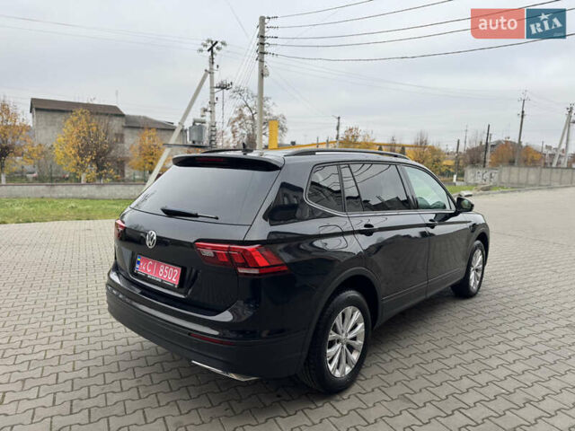 Черный Фольксваген Тигуан, объемом двигателя 2 л и пробегом 232 тыс. км за 14300 $, фото 13 на Automoto.ua