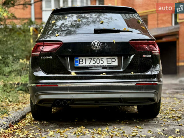 Чорний Фольксваген Тігуан, об'ємом двигуна 1.97 л та пробігом 70 тис. км за 31500 $, фото 4 на Automoto.ua