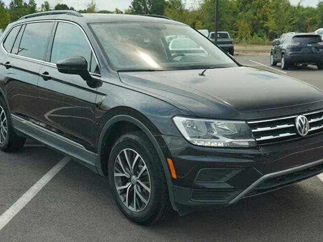 Чорний Фольксваген Тігуан, об'ємом двигуна 2 л та пробігом 47 тис. км за 9500 $, фото 2 на Automoto.ua