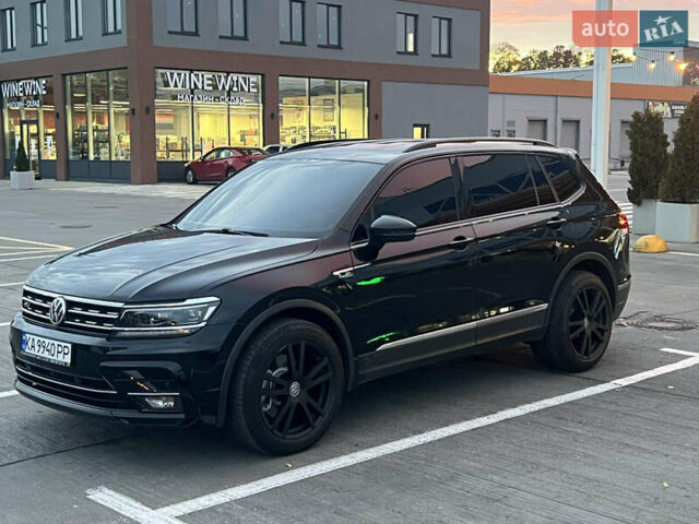 Чорний Фольксваген Тігуан, об'ємом двигуна 2 л та пробігом 56 тис. км за 23700 $, фото 6 на Automoto.ua