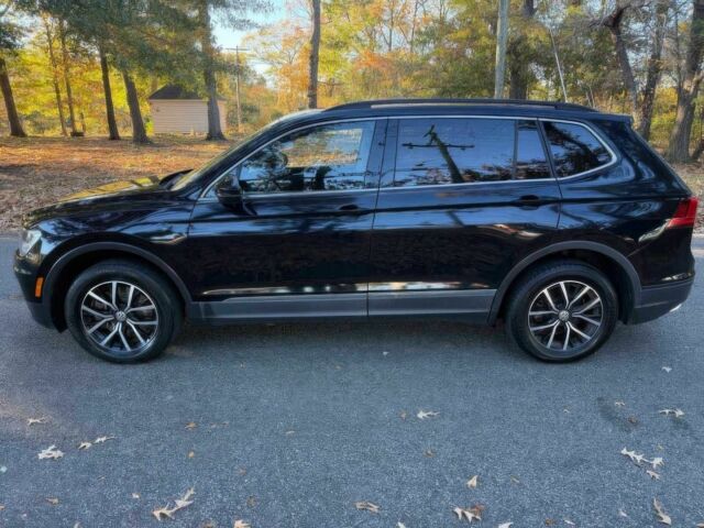 Чорний Фольксваген Тігуан, об'ємом двигуна 2 л та пробігом 26 тис. км за 12300 $, фото 3 на Automoto.ua