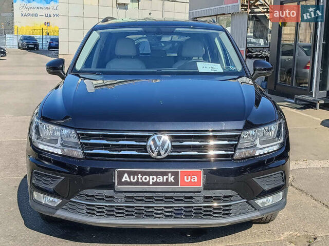 Черный Фольксваген Тигуан, объемом двигателя 2 л и пробегом 46 тыс. км за 22380 $, фото 1 на Automoto.ua