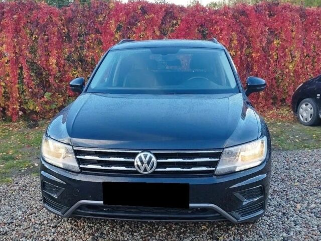 Черный Фольксваген Тигуан, объемом двигателя 2 л и пробегом 75 тыс. км за 11300 $, фото 1 на Automoto.ua