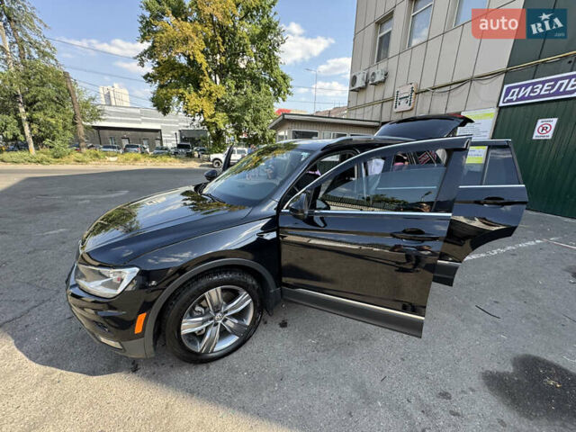 Черный Фольксваген Тигуан, объемом двигателя 1.98 л и пробегом 56 тыс. км за 28000 $, фото 1 на Automoto.ua