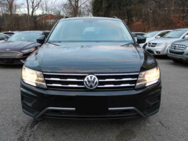 Черный Фольксваген Тигуан, объемом двигателя 2 л и пробегом 15 тыс. км за 17000 $, фото 1 на Automoto.ua