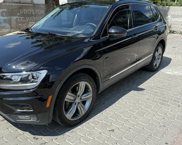 Черный Фольксваген Тигуан, объемом двигателя 1.98 л и пробегом 128 тыс. км за 23000 $, фото 4 на Automoto.ua