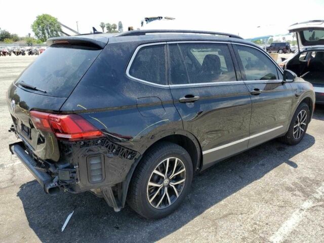 Чорний Фольксваген Тігуан, об'ємом двигуна 2 л та пробігом 75 тис. км за 3800 $, фото 2 на Automoto.ua