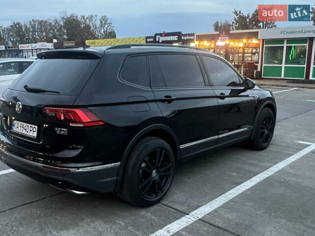 Чорний Фольксваген Тігуан, об'ємом двигуна 2 л та пробігом 56 тис. км за 23700 $, фото 5 на Automoto.ua