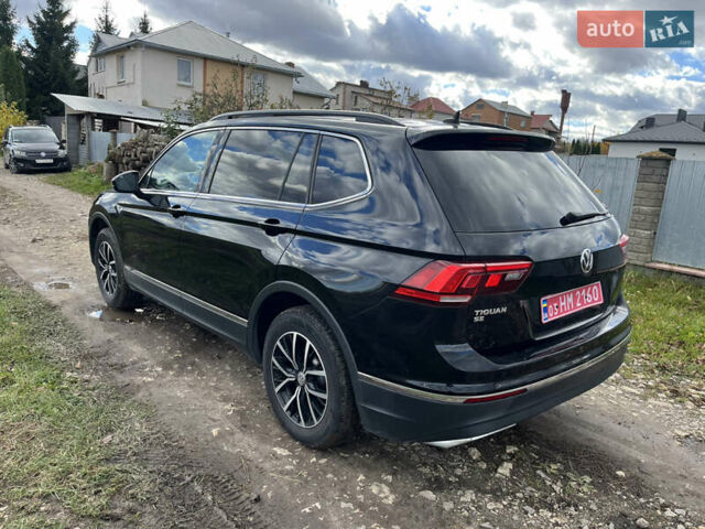Черный Фольксваген Тигуан, объемом двигателя 2 л и пробегом 107 тыс. км за 21500 $, фото 1 на Automoto.ua