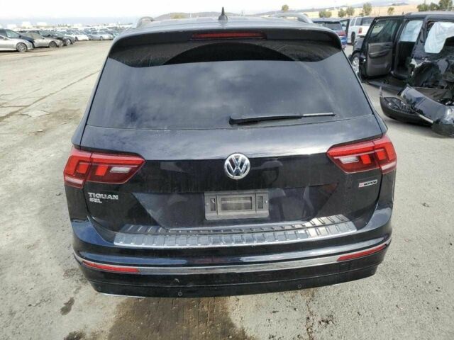 Черный Фольксваген Тигуан, объемом двигателя 2 л и пробегом 49 тыс. км за 6200 $, фото 5 на Automoto.ua