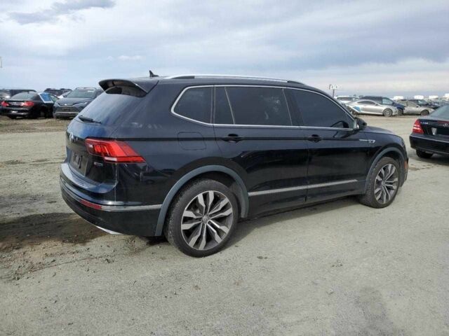 Черный Фольксваген Тигуан, объемом двигателя 2 л и пробегом 49 тыс. км за 6200 $, фото 2 на Automoto.ua