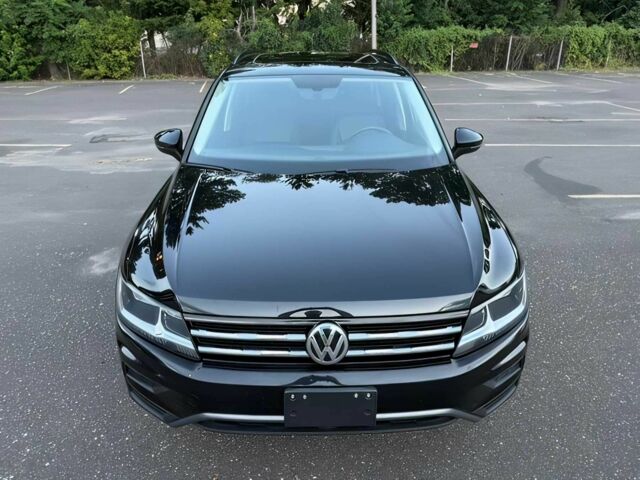 Черный Фольксваген Тигуан, объемом двигателя 2 л и пробегом 30 тыс. км за 14400 $, фото 1 на Automoto.ua