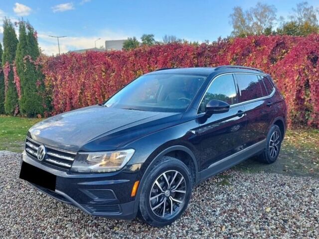 Черный Фольксваген Тигуан, объемом двигателя 2 л и пробегом 75 тыс. км за 11300 $, фото 2 на Automoto.ua