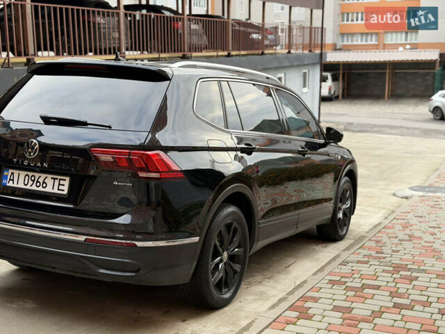 Чорний Фольксваген Тігуан, об'ємом двигуна 1.98 л та пробігом 144 тис. км за 22300 $, фото 4 на Automoto.ua
