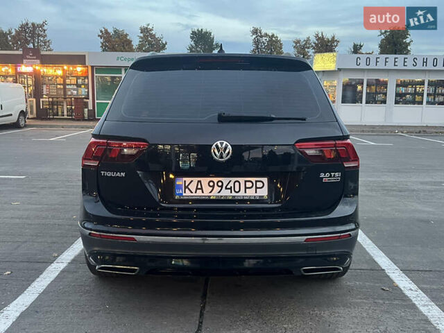 Чорний Фольксваген Тігуан, об'ємом двигуна 2 л та пробігом 56 тис. км за 23700 $, фото 4 на Automoto.ua
