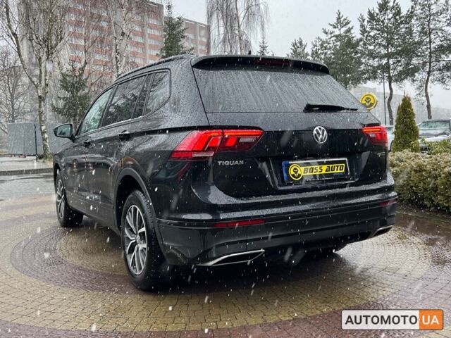 Чорний Фольксваген Тігуан, об'ємом двигуна 2 л та пробігом 37 тис. км за 25800 $, фото 4 на Automoto.ua